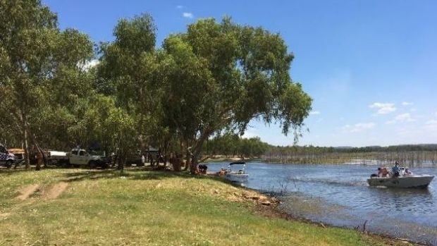 An air, land and water search continues after a nine-year-old boy was hit by a jet-ski driven by his father at Lake Moondarra near Mount Isa. Photo: Toby Crockford